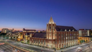 USC Fertitta building at dusk