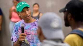 Musician and producer Pharrell Williams speaks to Freedom School students