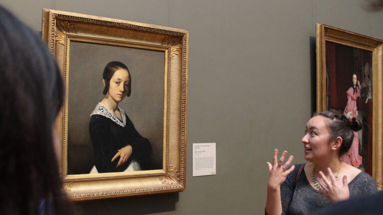 Student talks about painting
