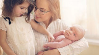 Mom, little girl, and baby