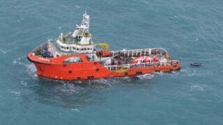 Orange rescue boat in ocean