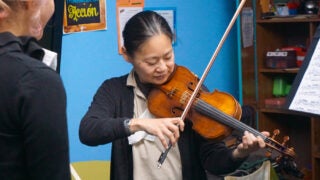 female playing violin