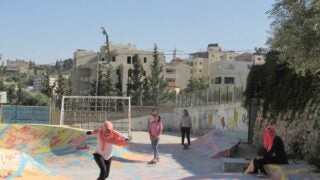 three girls skating