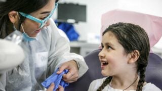 dental student with patient