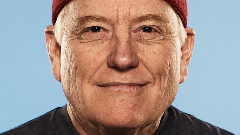 Headshot of senior wearing a USC headband