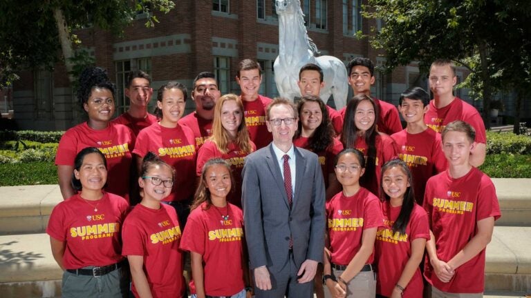 Michael Quick with high school students