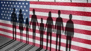 Silhouettes in front of American flag illustration