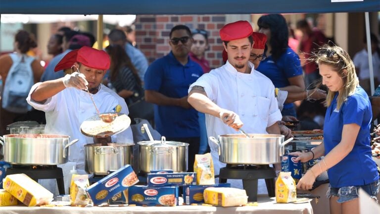Barilla workers serving food