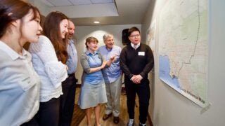 people looking at a map