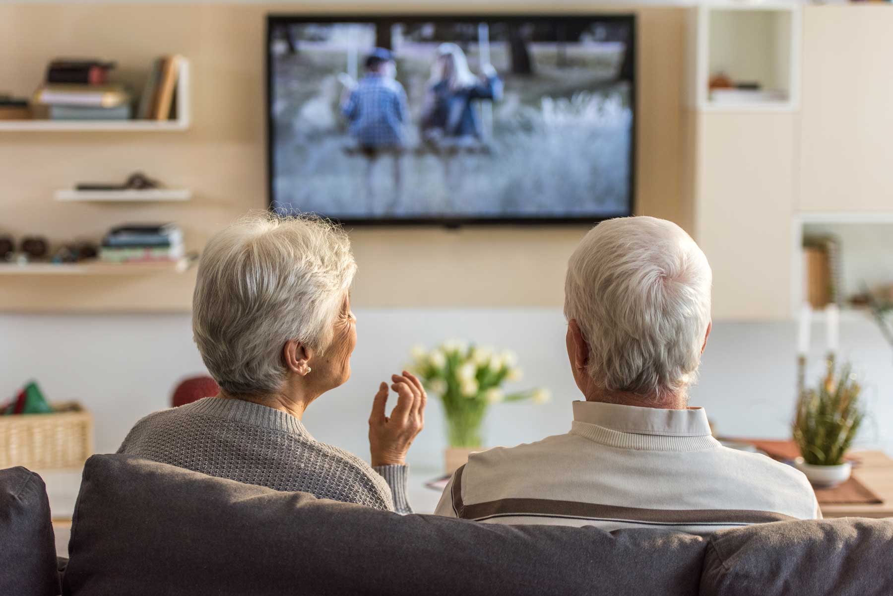 Seniors Enjoying TV in Common Area