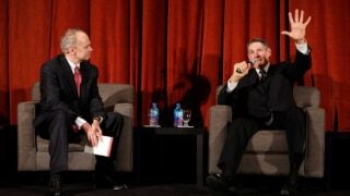 Gary K. Michelson onstage with Dauchot