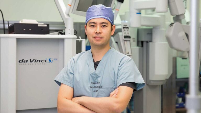 Andrew Hung wearing surgical scrubs