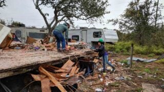 students remove debris