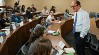 C. L. Max Nikias speaking with students