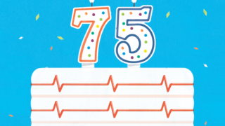 Cake with a candles showing 75