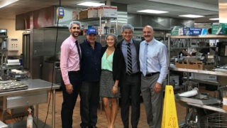 students volunteering at food bank