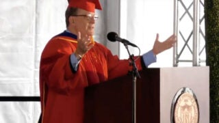 Man speaking at podium