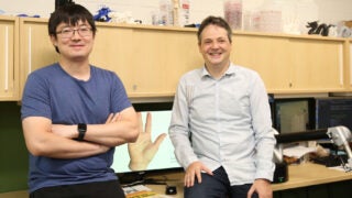 PhD candidate Bohan Wang and USC Viterbi Professor Jernej Barbic, from left, have developed a human hand model that could benefit areas like virtual reality, prosthetics and robotics.