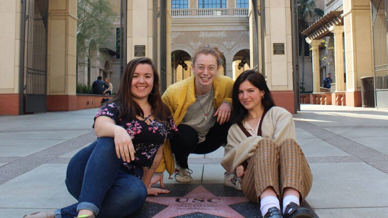 Students posing with the Hollywood stars
