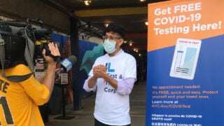 Neil Vora talks to local news during an event to promote testing for COVID-19 in New York City. (Photo/Courtesy of Neil Vora)