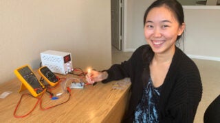 USC senior Elizabeth Zhou builds and tests a basic electrical circuit for an advanced physics course using equipment sent to her home in Dallas. (Photo/Courtesy of Elizabeth Zhou)