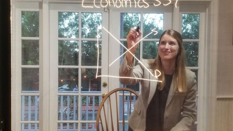 Emily Nix built her own lightboard to bring her economics lectures to life while teaching online this fall.