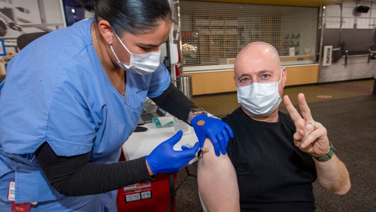Nurse administering COVID-19 vaccine