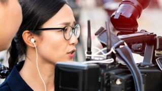 female director filming