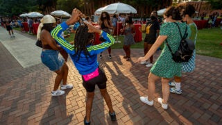 Students dancing at welcome dinner