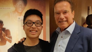 Victor Qiu and Arnold Schwarzenegger