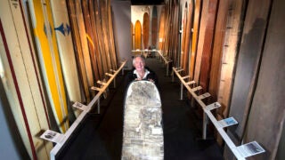 Tom Morey holding a boogie board