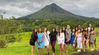 John and Julia Walsh with students in Costa Rica