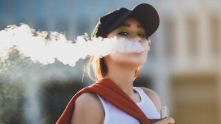 female smoking vape