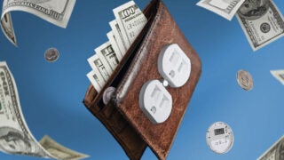 wallet with dollar bills and coins floating