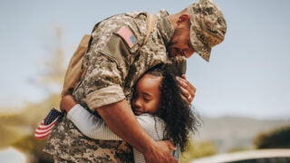 Veteran and young girl