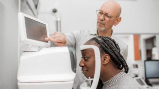 Woman taking eye exam