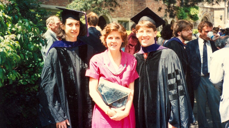 Elyn Saks graduating with two people