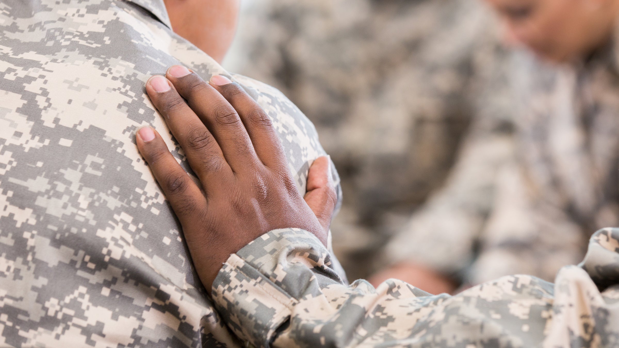 Soldiers pray during therapy session