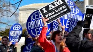 Protestors clash outside the U.S. Supreme Court building