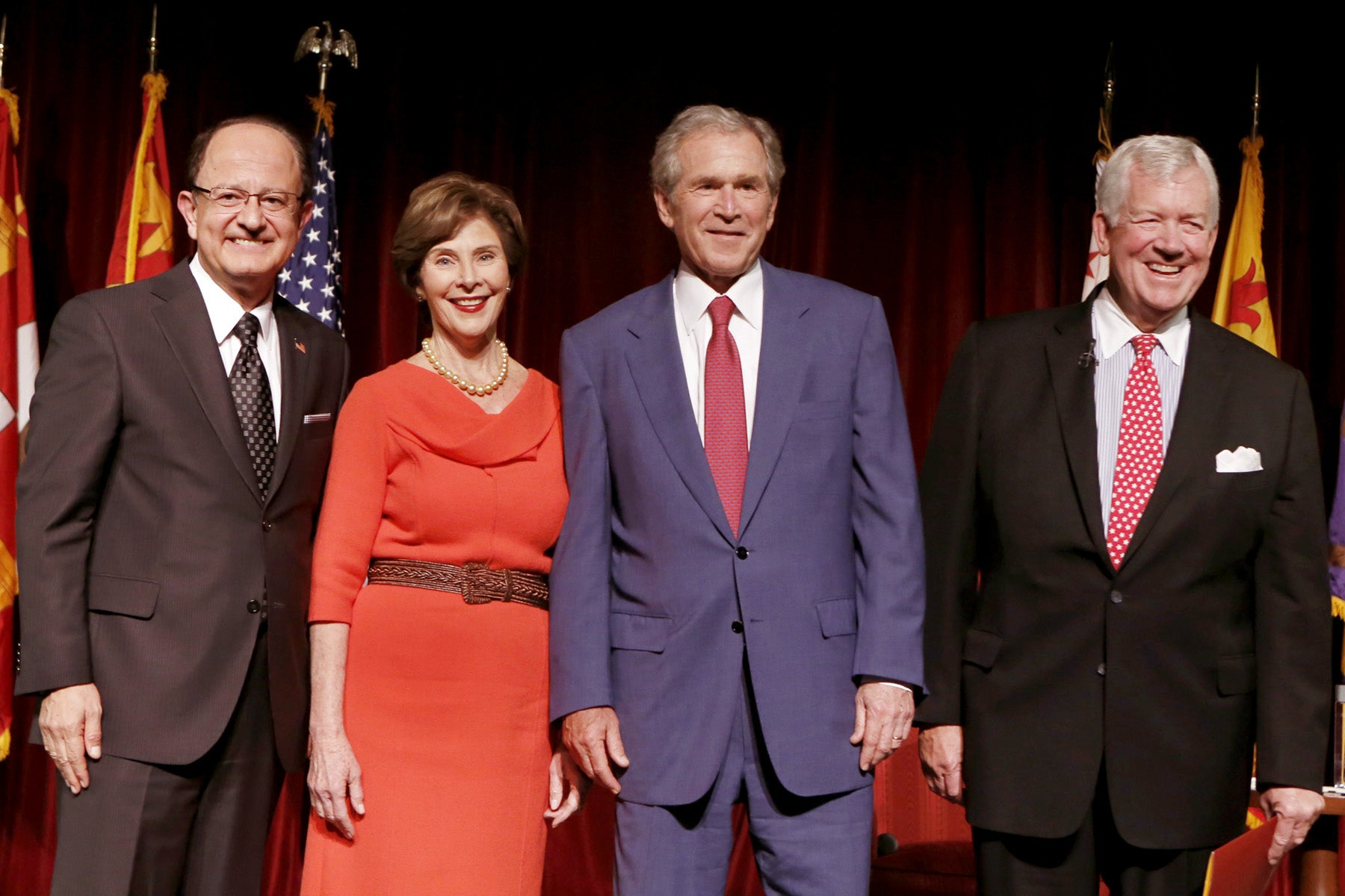 George and Laura bush posing with administration