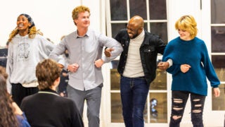 Wayne Brady and Jonathan Magnum with students
