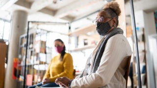 Two people in masked during the COVID-19 pandemic