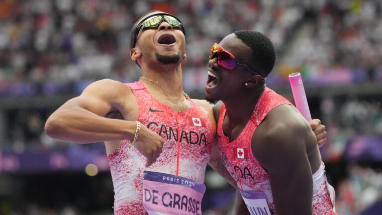 Two men celebrating