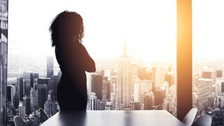 Photo: Woman in the executive suite