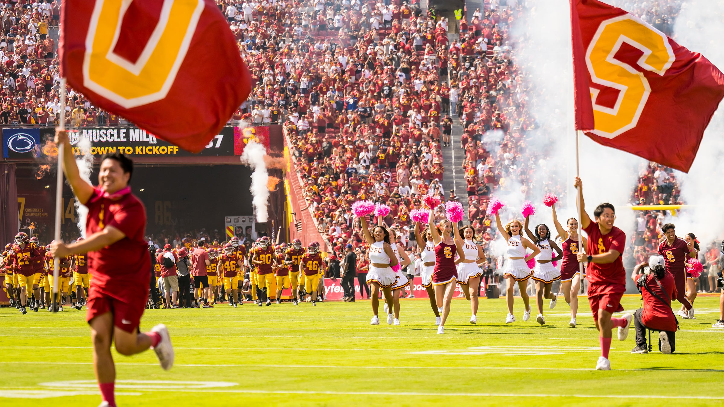 Spirit of Troy: Spirit and Song Leaders take the field during Penn State-USC game