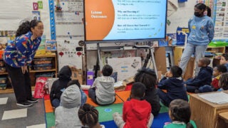 Teachers with students