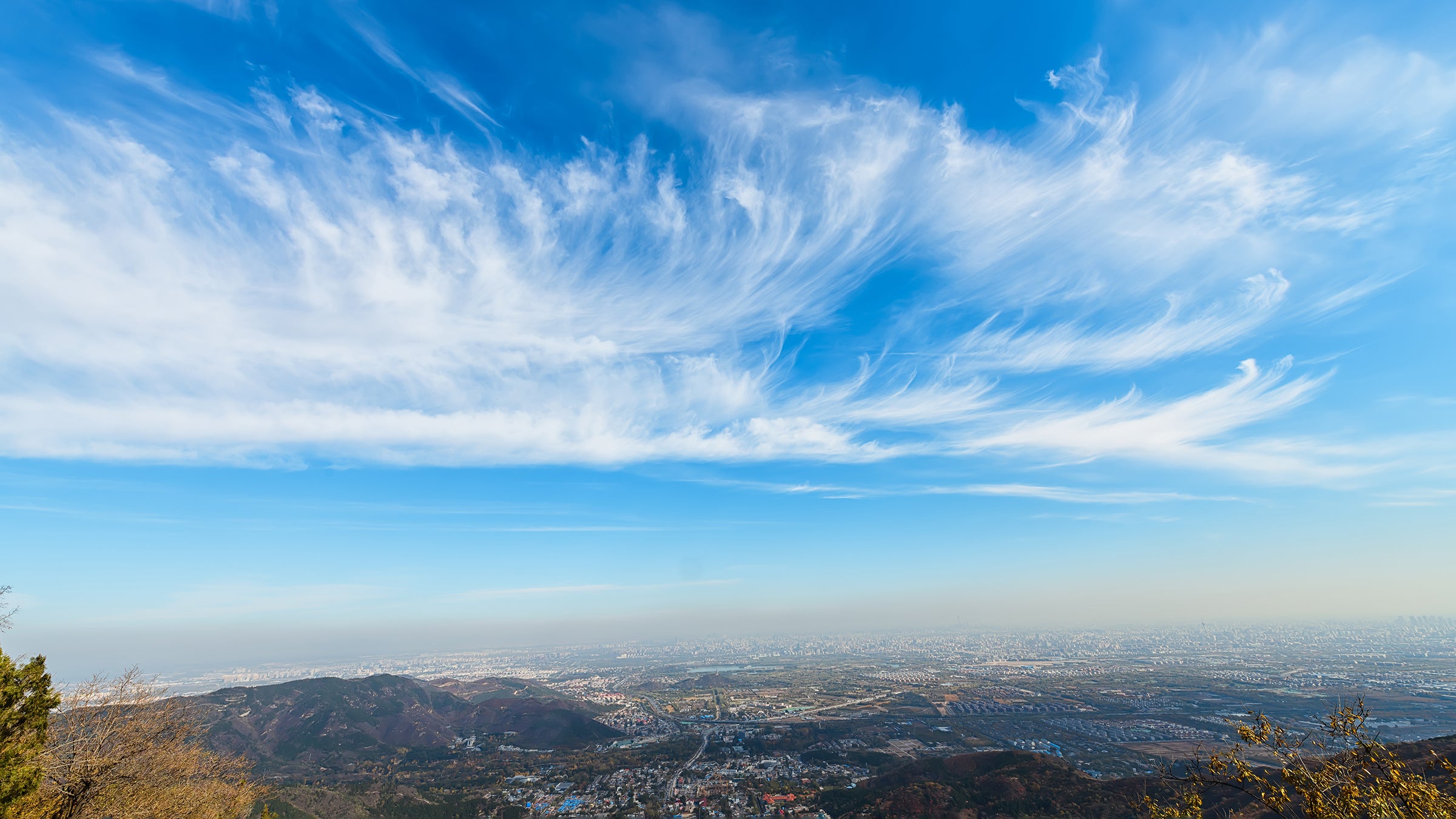 Blue sky and white clouds over the city