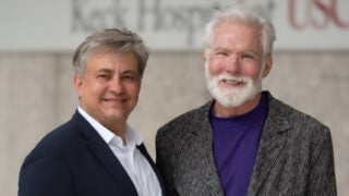 Denis Evseenko, left, and R. Rex Parris