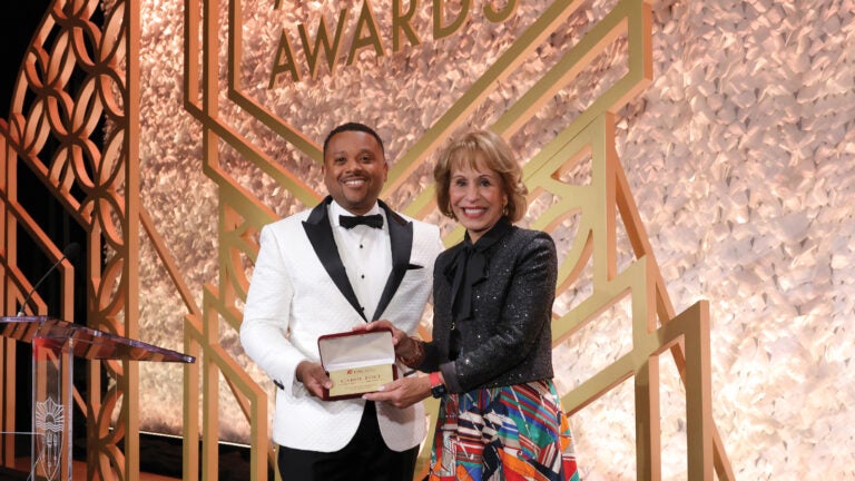 USCAA Board of Governors President Daniel Prince and USC President Carol Folt at the USC Alumni Awards Gala. (Photo/Greg Grudt)