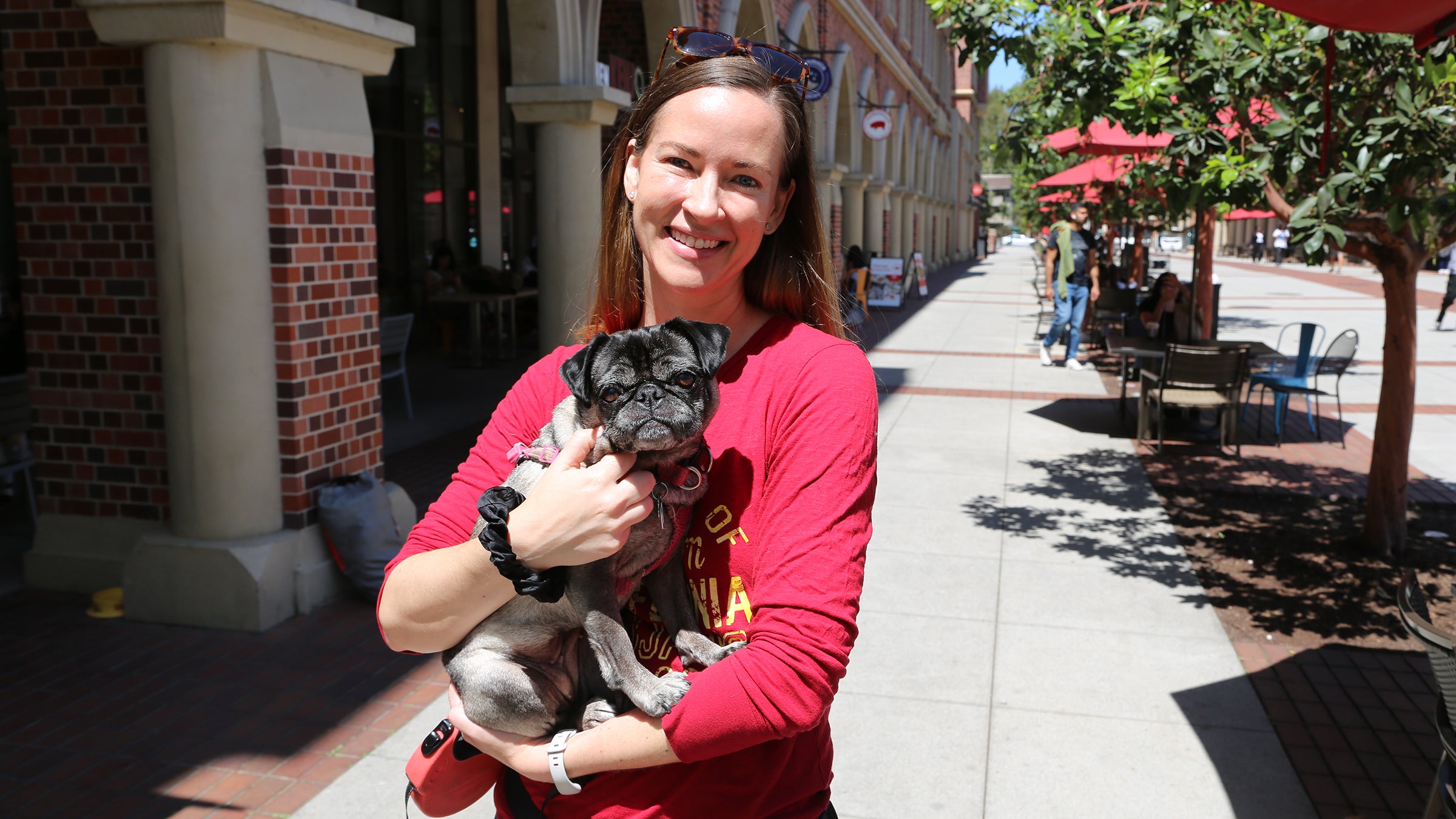 Professor Trisha Tucker adopted her dog, Pugsly, to help build relationships with students. (USC Photo/Stephen Gee)